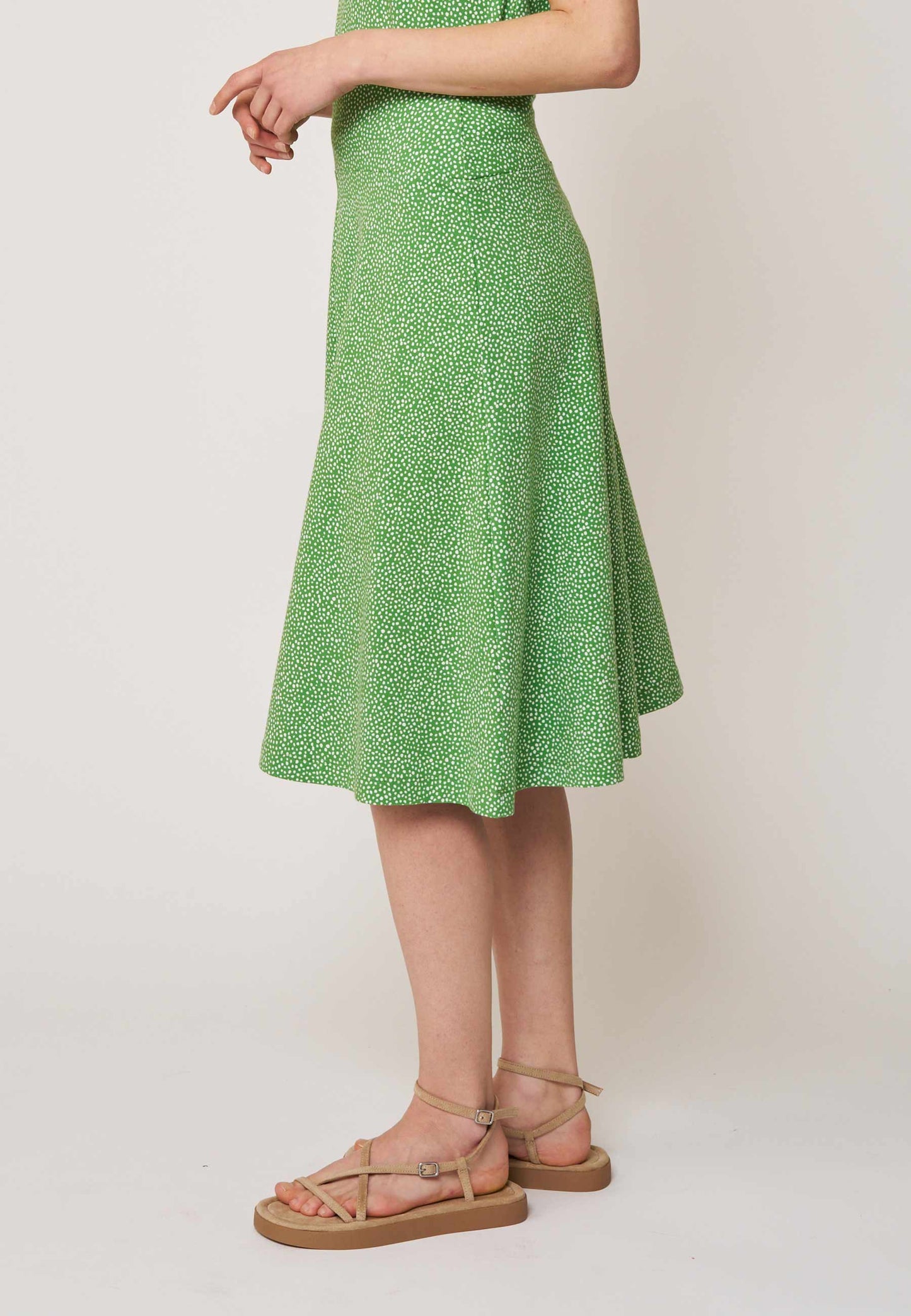 Rock, Modell Mila in lebhaftem Grün mit zartem Muster und schwingendem Schnitt für sommerliche Eleganz